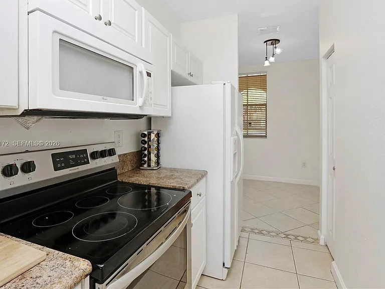 9353 SW 227th St — Photo 3
