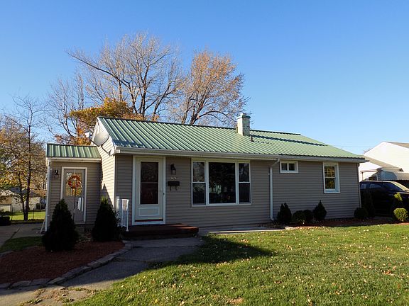 Newly sided and metal roof