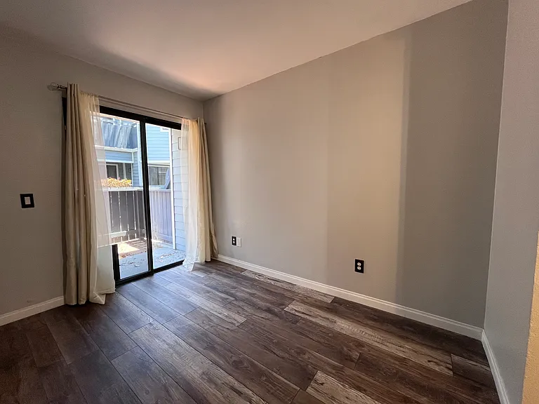 Bedroom Two with door to Side Patio