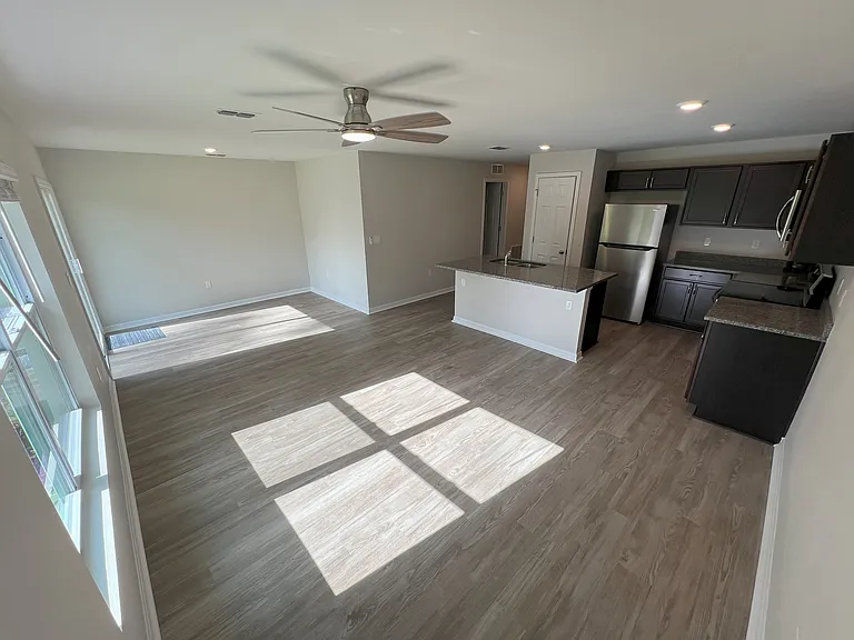 Living / Dining area of similar property