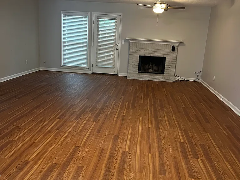 Large family room open from kitchen to back door.