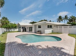 5 Mendota Ln, Sea Ranch Lakes, FL 33308