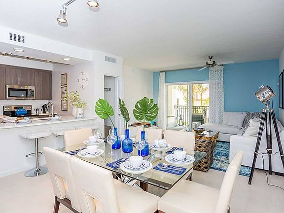 Dining, kitchen, and living area