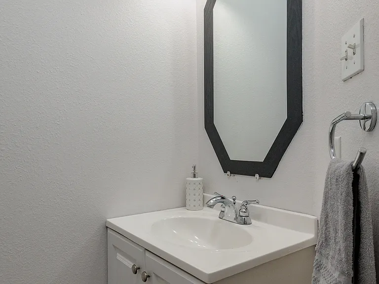 Half bath with vanity sink.