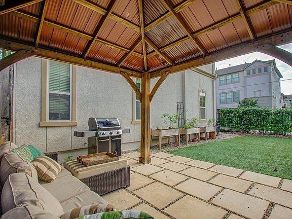 Beautiful corner lot!! Light on all three sides of home, uncommon for the neighborhood. OVER 1,200 sq ft fenced in yard with patio, gazebo, raised garden beds (blueberries included). Yard has artificial grass so perfect for little ones or pets (yes pets a