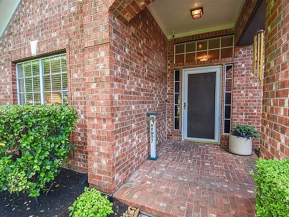 A deep front porch welcomes and protects you from the elements!