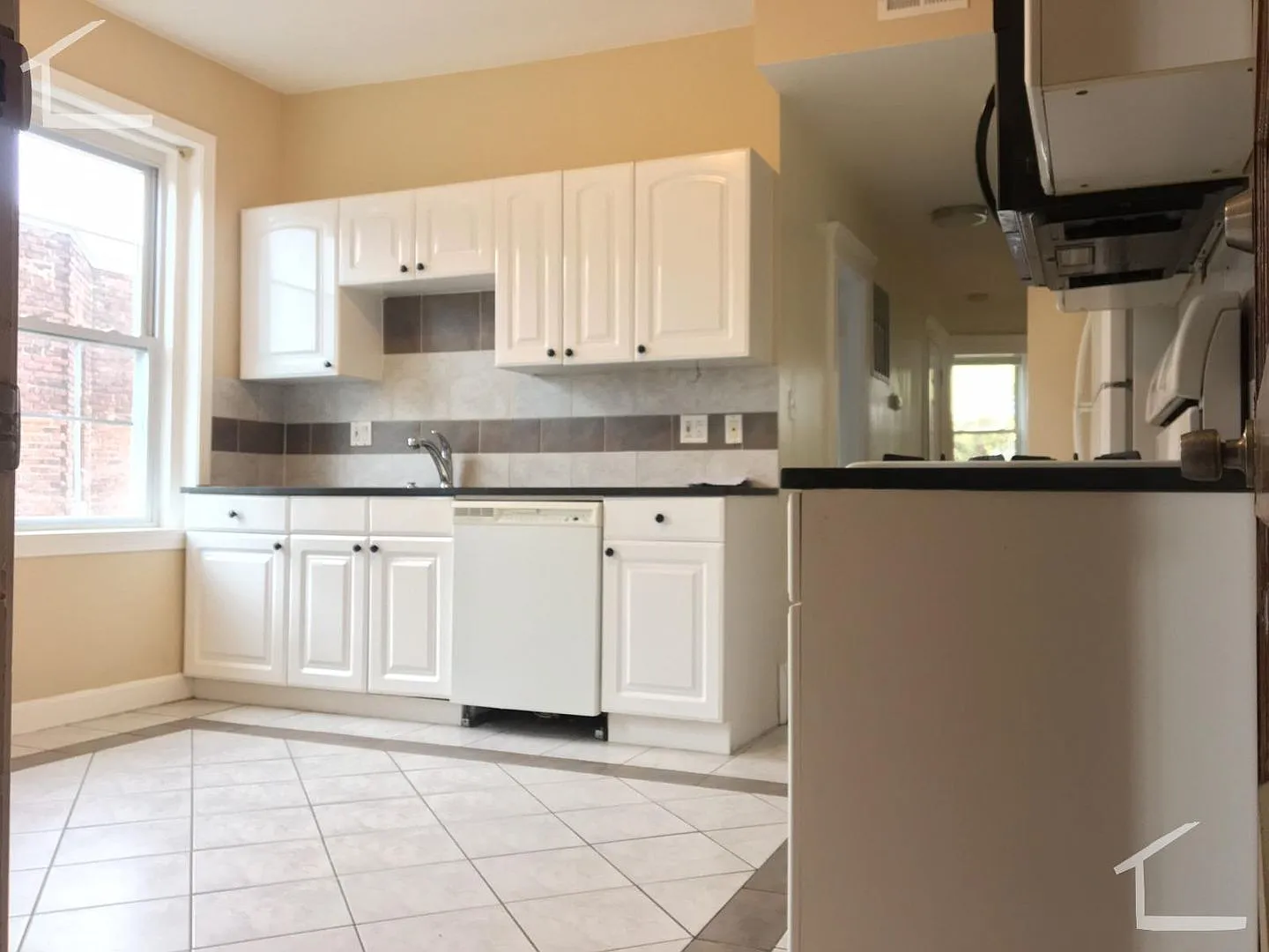 $3,600 Spacious 3BR in Brookline | 1,600 SF | In-Unit Laundry + Private Outdoor Space — Photo 2