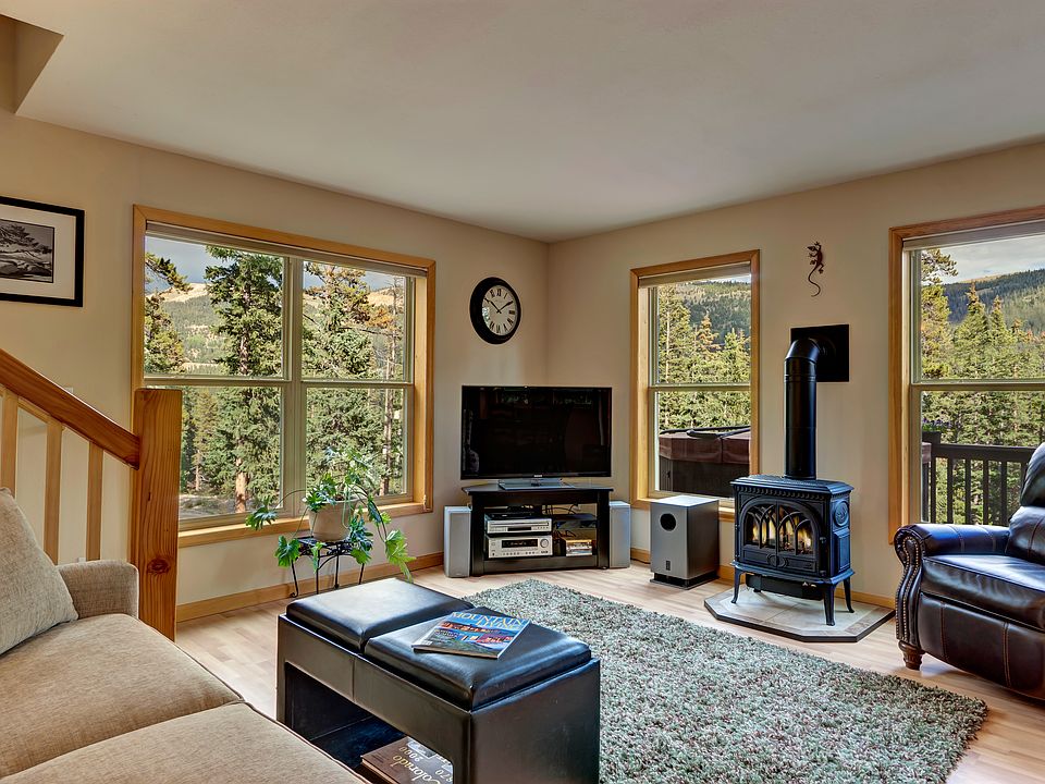 Sun filled living room with mountain views