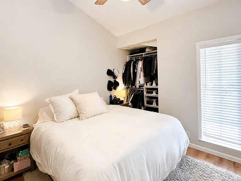 Master bedroom with vaulted ceilings and 2 closets