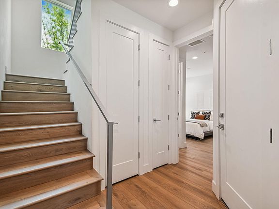 First Floor Foyer - Garage Entry - Storage - Guest En Suite