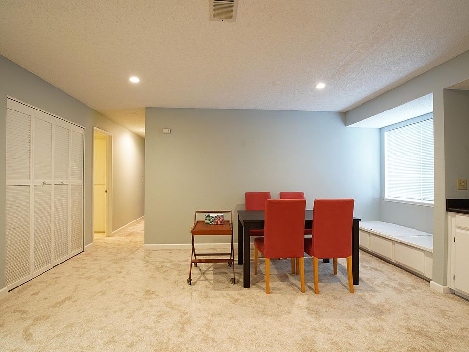 Living Room and washer/dryer unit and hall