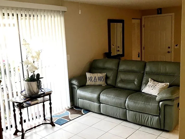 Family room with access to side lanai screened porch.