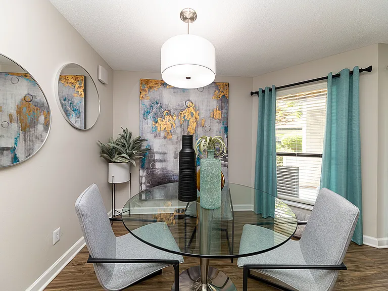 Dining area with hardwood-style flooring
