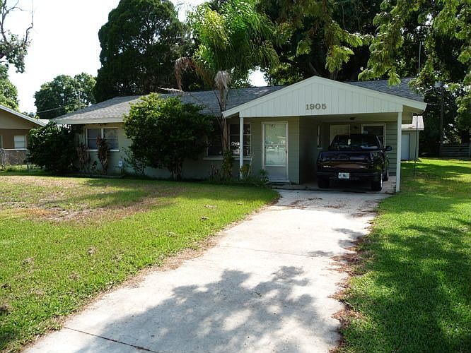 Detached garage in rear.