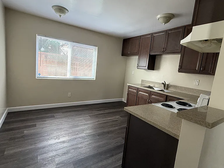 Kitchen with space for dinette set.