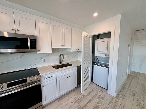 Kitchen with Stackable Laundry