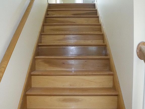 Enter the front door and head upstairs to the hallway leading to the spacious master bedroom with three large closets and reading alcove, bathroom, hall closet, an office or playroom.