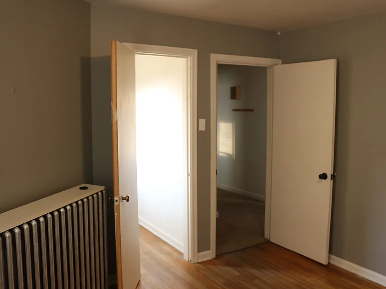 Main Bedroom towards walk-in closet and exit