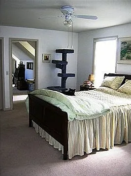 Master bedroom, part view of the sitting room (or office above garage)