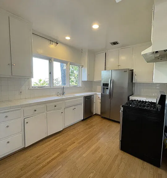 6216 Temple Hill Dr — Photo 9