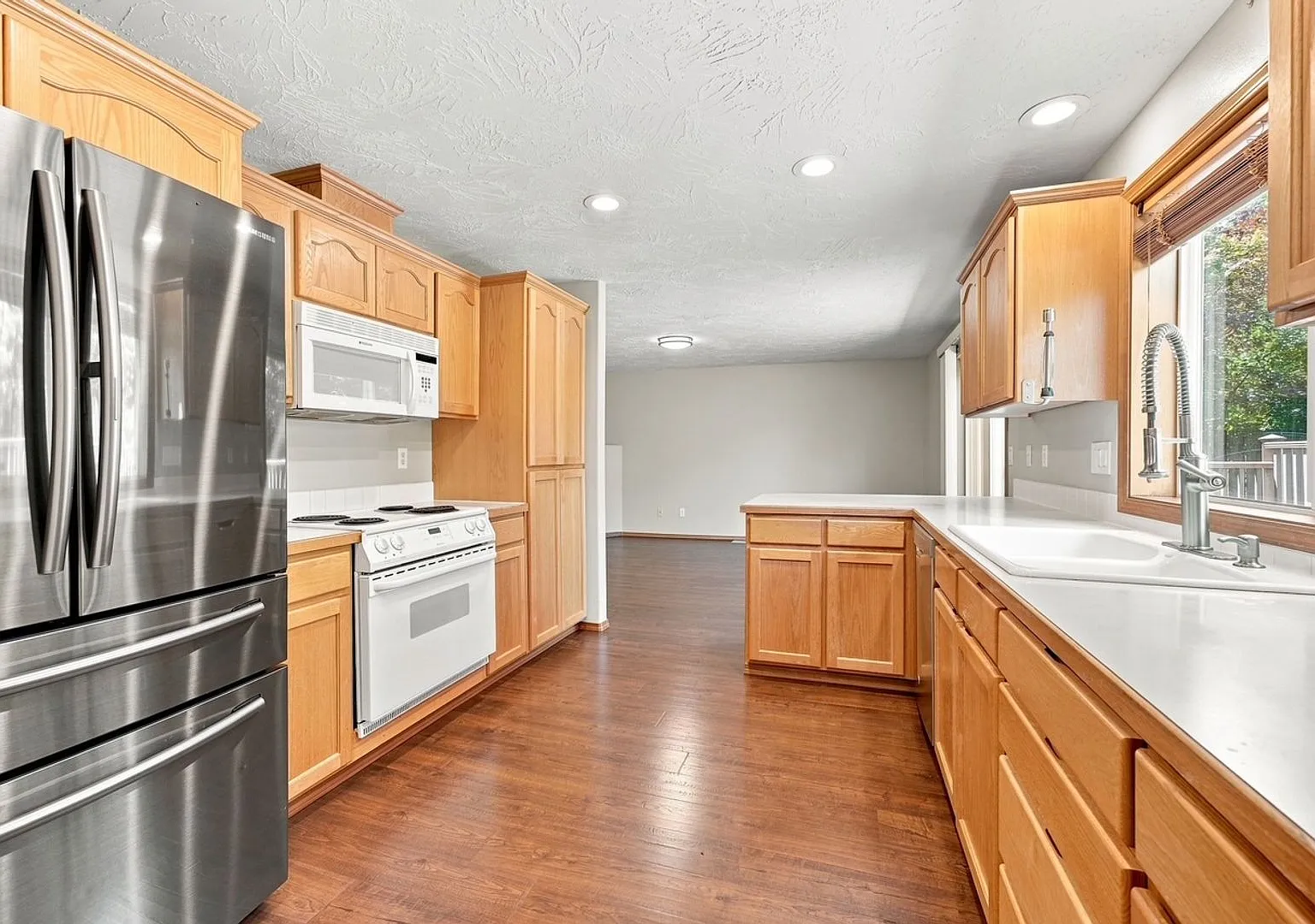 Charming 3-Bedroom Home with a Private Landscaped Yard Oasis — Photo 2