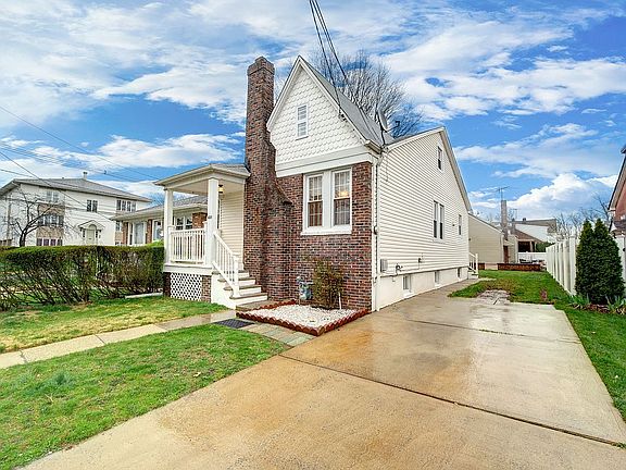 Brick front with driveway 