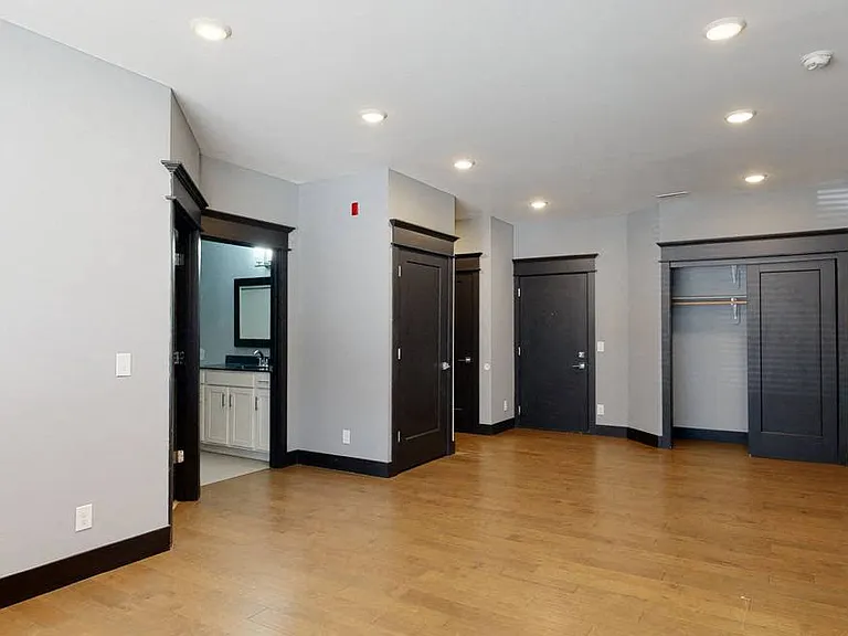 Sleek flooring and an open layout offer the perfect space to personalize and make your own.