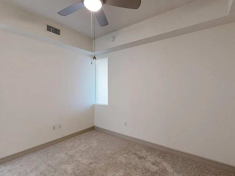 Spacious apartment Bedroom with Carpet Floor.