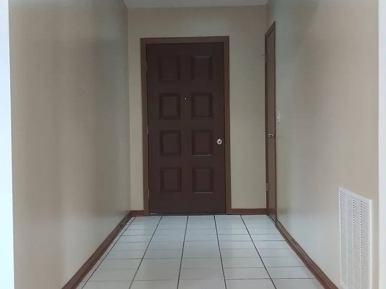 Tiled Entryway with Skylight.