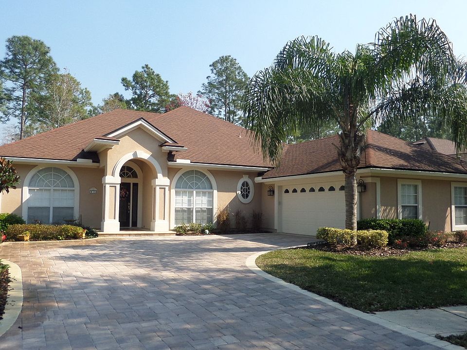 Front with paver driveway