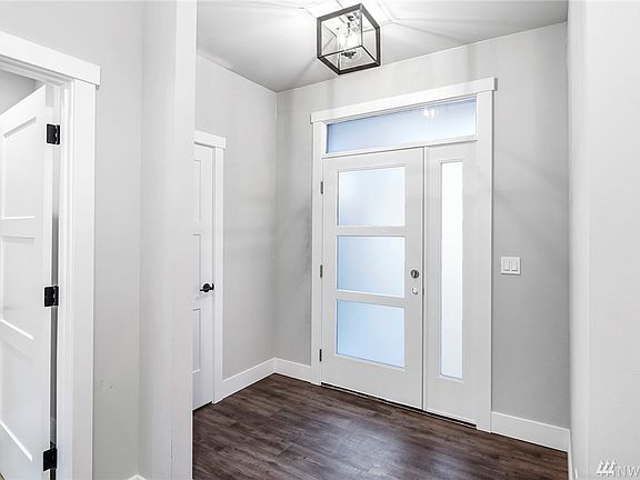 Lovely entry with coat closet to the left.