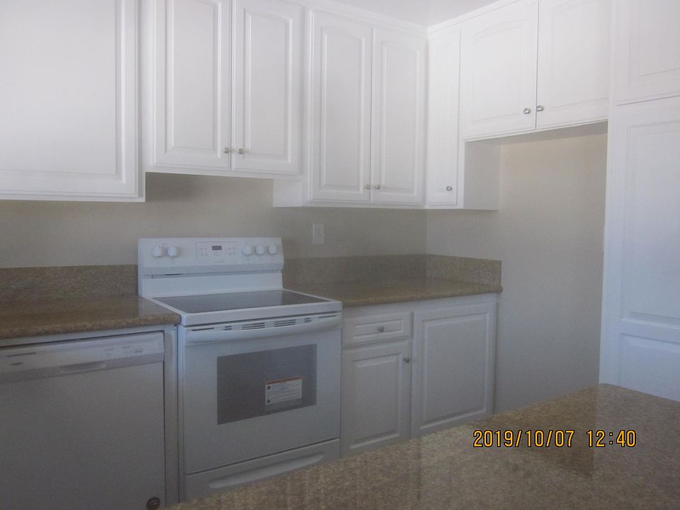 New kitchen stove with opening for refrigerator