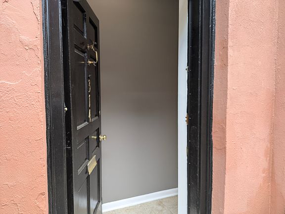 Private entrance, accent wall