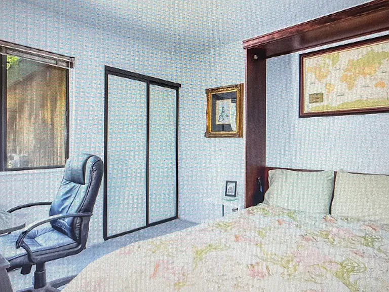 First floor bedroom/office, equipped with Queen fold down bed