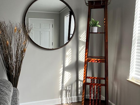 Coat rack and full size closet in the living room