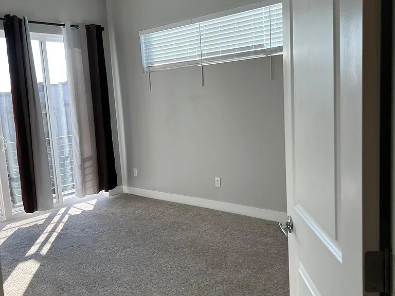 Nice size master room with a spacious walking closet and private balcony.