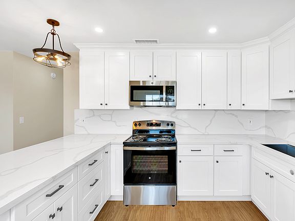 NEW STAINLESS STEEL APPLIANCES