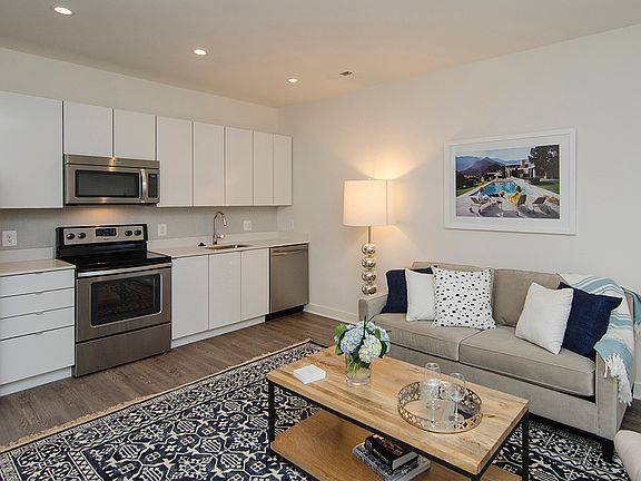 One-bedroom apartment living area (staged)