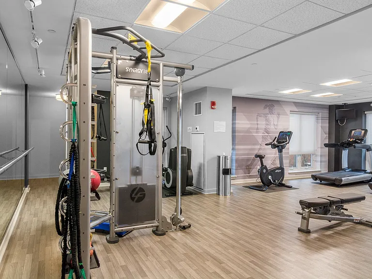 Strength equipment at The Amelia Apartments in Quincy, MA