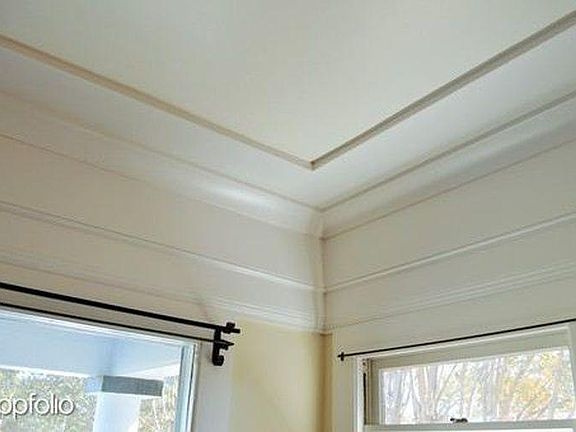 Original craftsman molding and window hardware throughout.