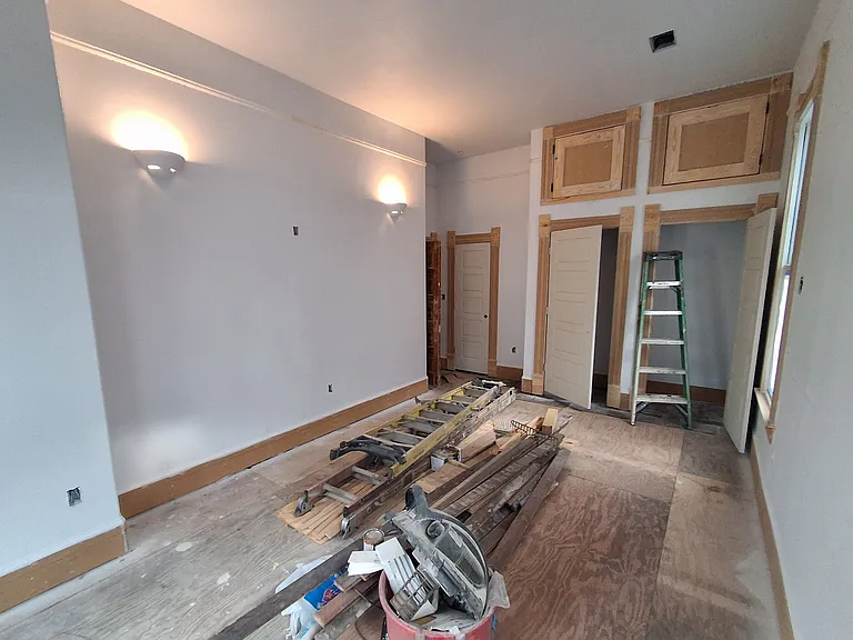 Looking into master bedroom northeast. Private powder room in corner.