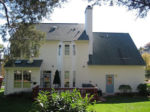 Back Exterior featuring  a deck off of the Family Room