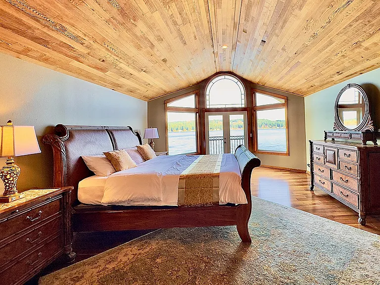 The primary suite features a king bed and spa inspired bathroom with soaking tub and walk in shower. Additional bedrooms provide flexible sleeping arrangements, ensuring every guest enjoys privacy and stunning views.