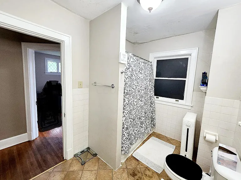 Full bathroom, second floor, tub with shower