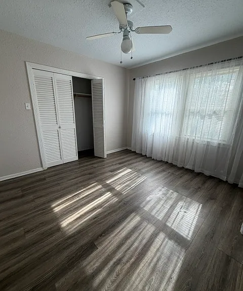 bedroom 2 with door opening to outside deck