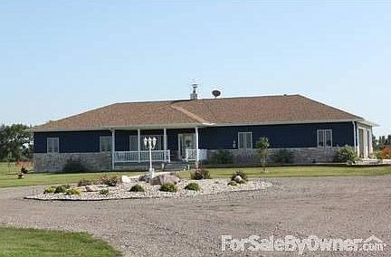 FRONT OF HOUSE
						:
						CIRCLE DRIVE. FRONT PORCH. OVER SIZED 3 CAR GARAGE