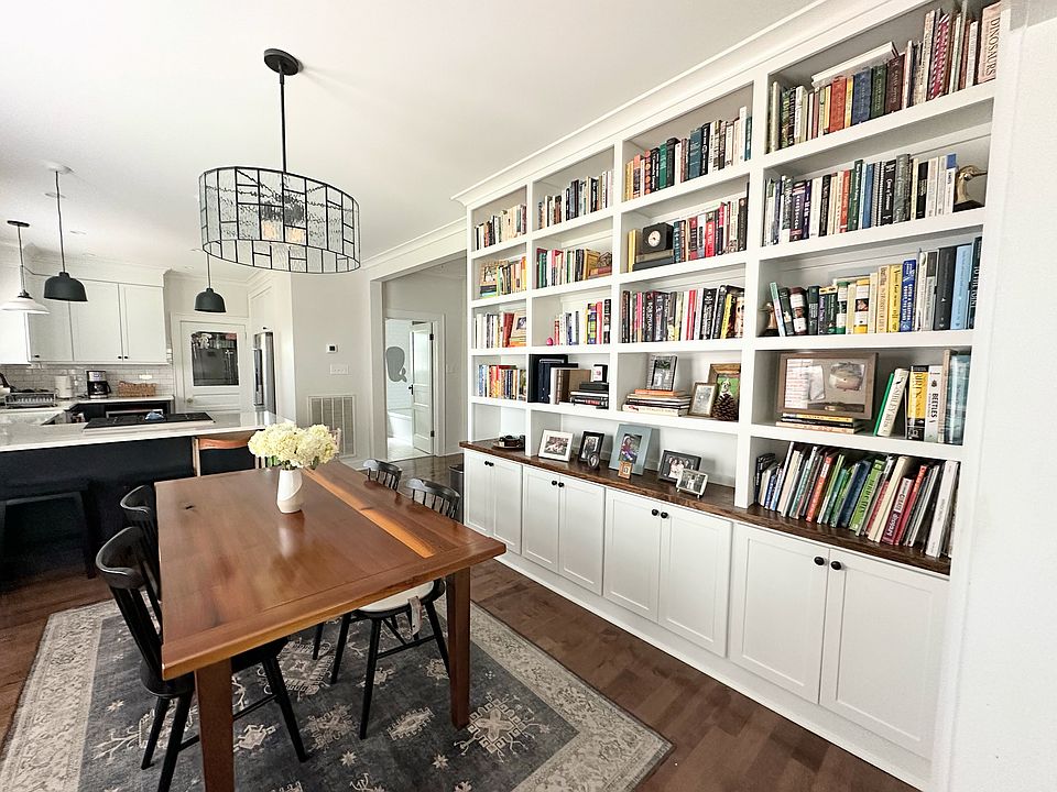 built in bookcase and cabinets for extra storage