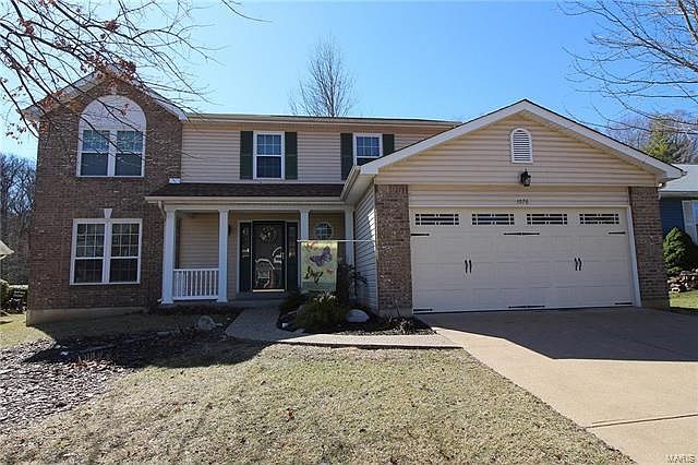 Newer windows, roof and garage door!