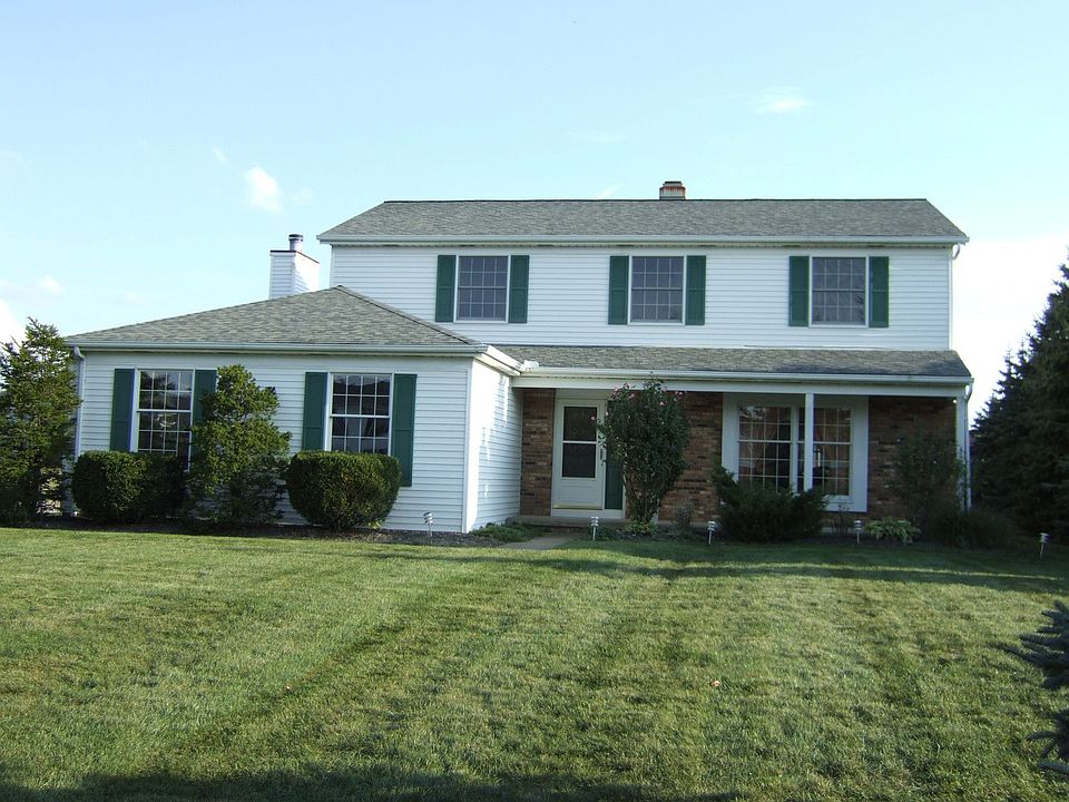 Center hall colonial in Spy Glass