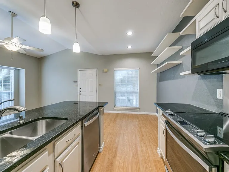 Kitchen view of dining area.